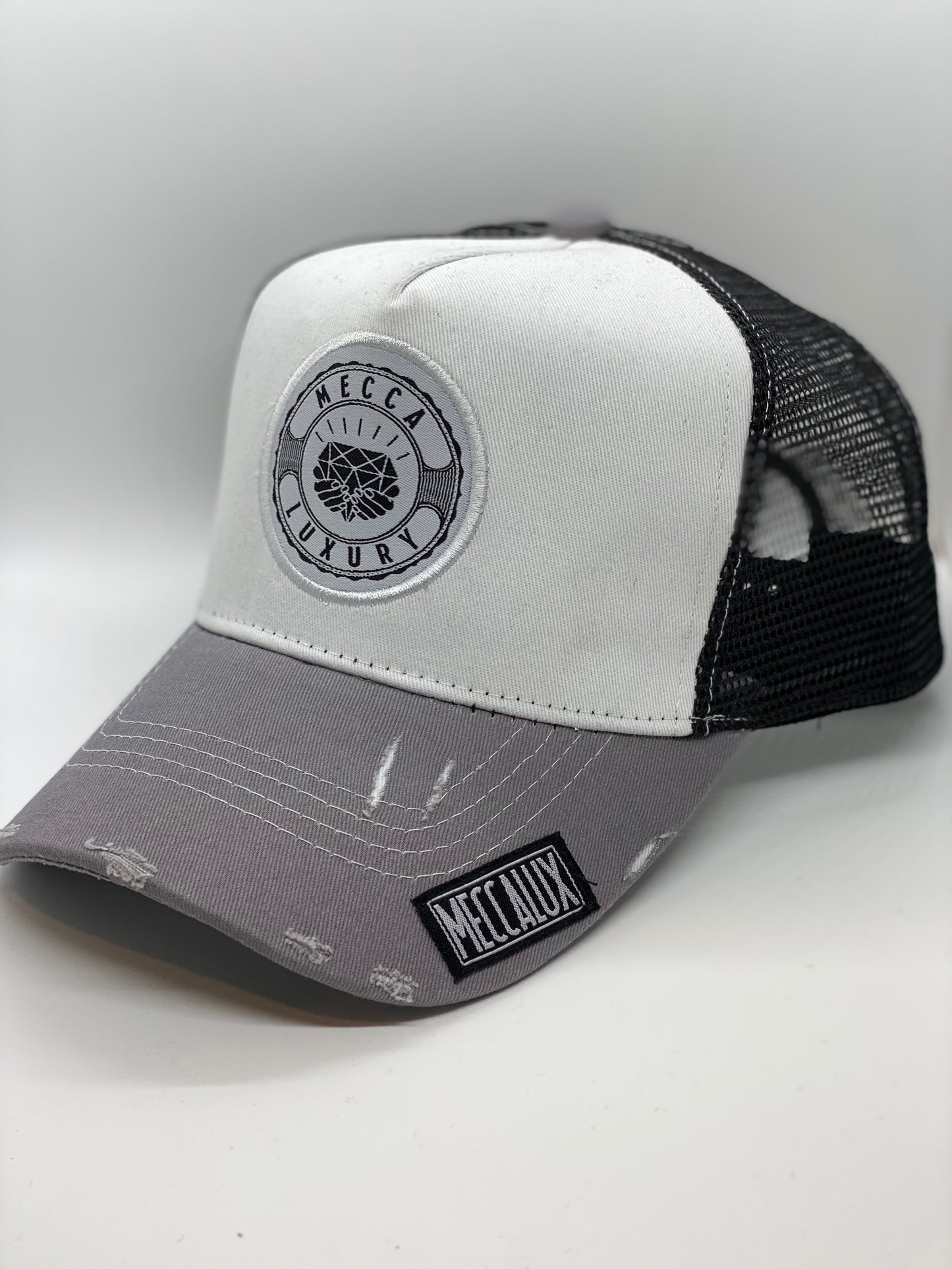 Distressed Meccalux Trucker Hat