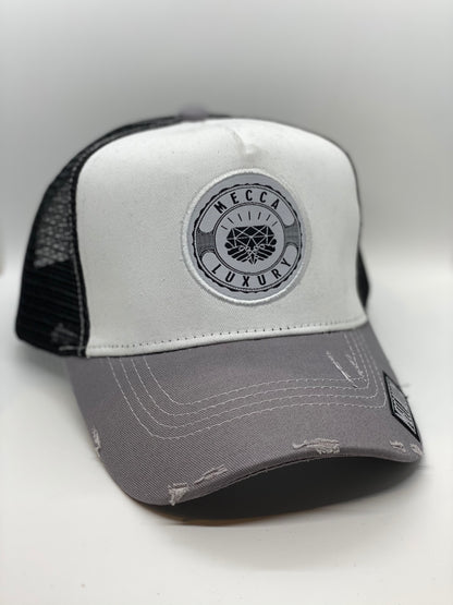 Distressed Meccalux Trucker Hat